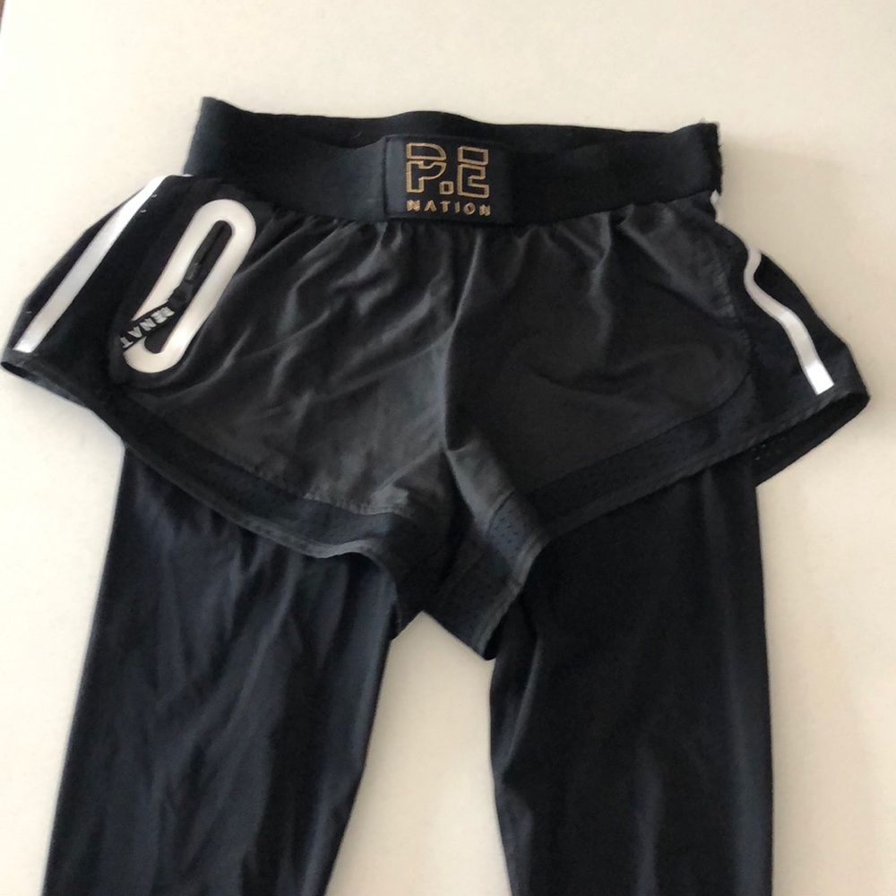 PE NATION black leggings. Built In shorts